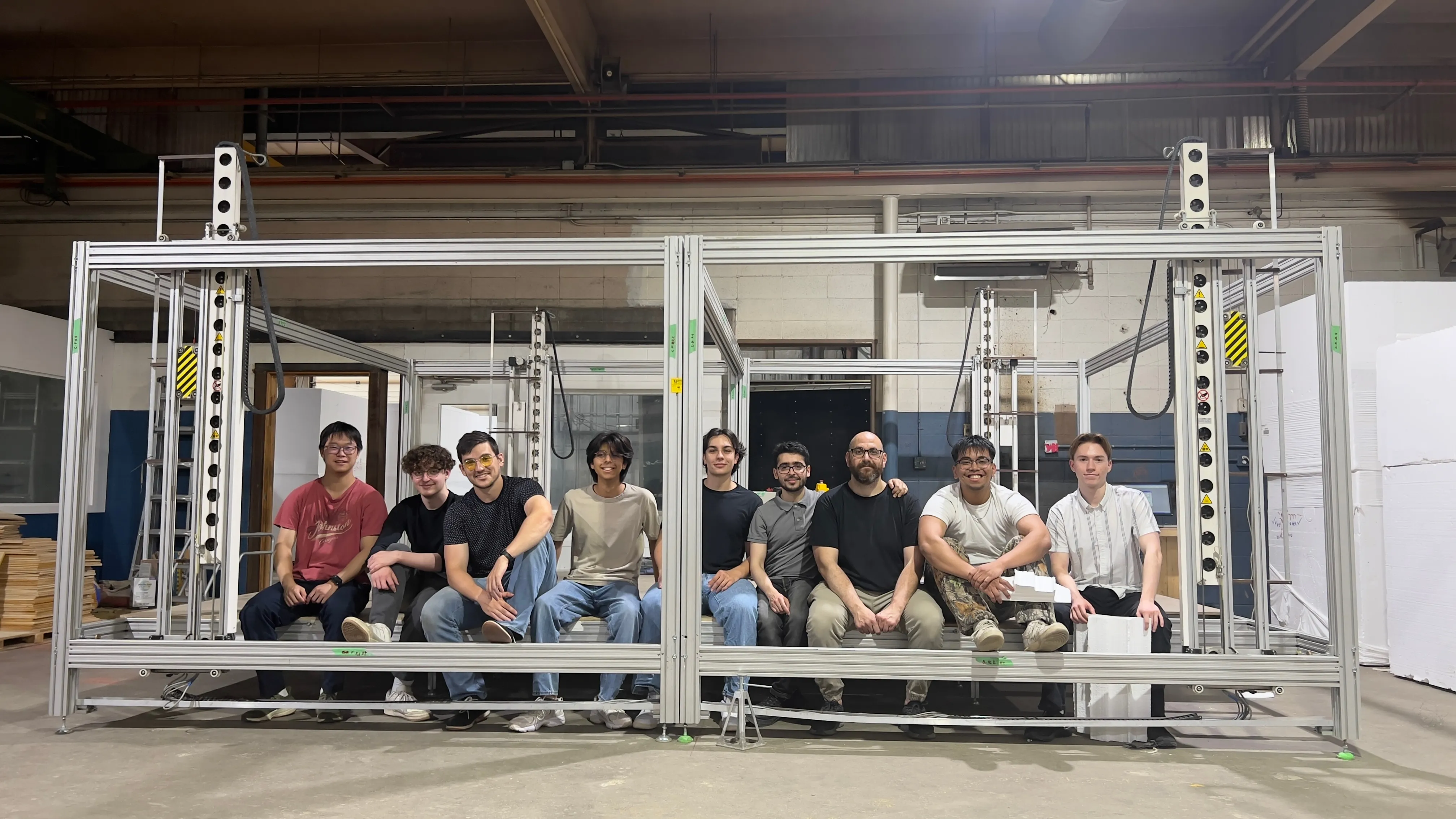 Handsome guys sitting (at work still) after working hard. Again